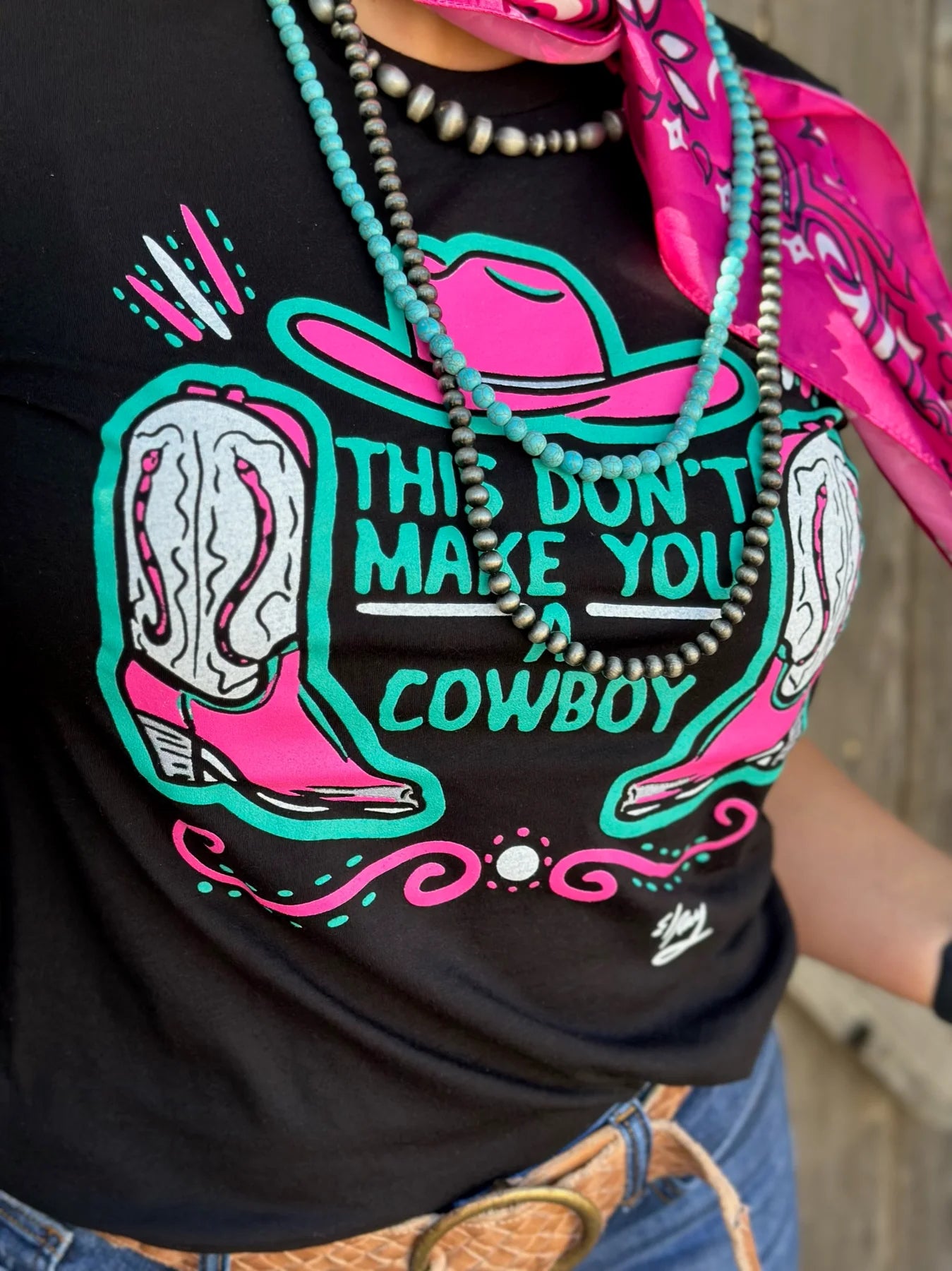 This Don't Make You A Cowboy Tee