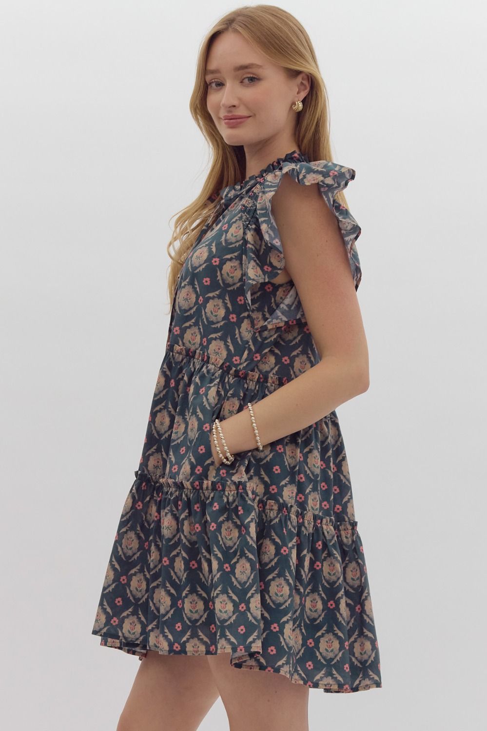Entro Printed v-neck mini dress featuring pockets at side