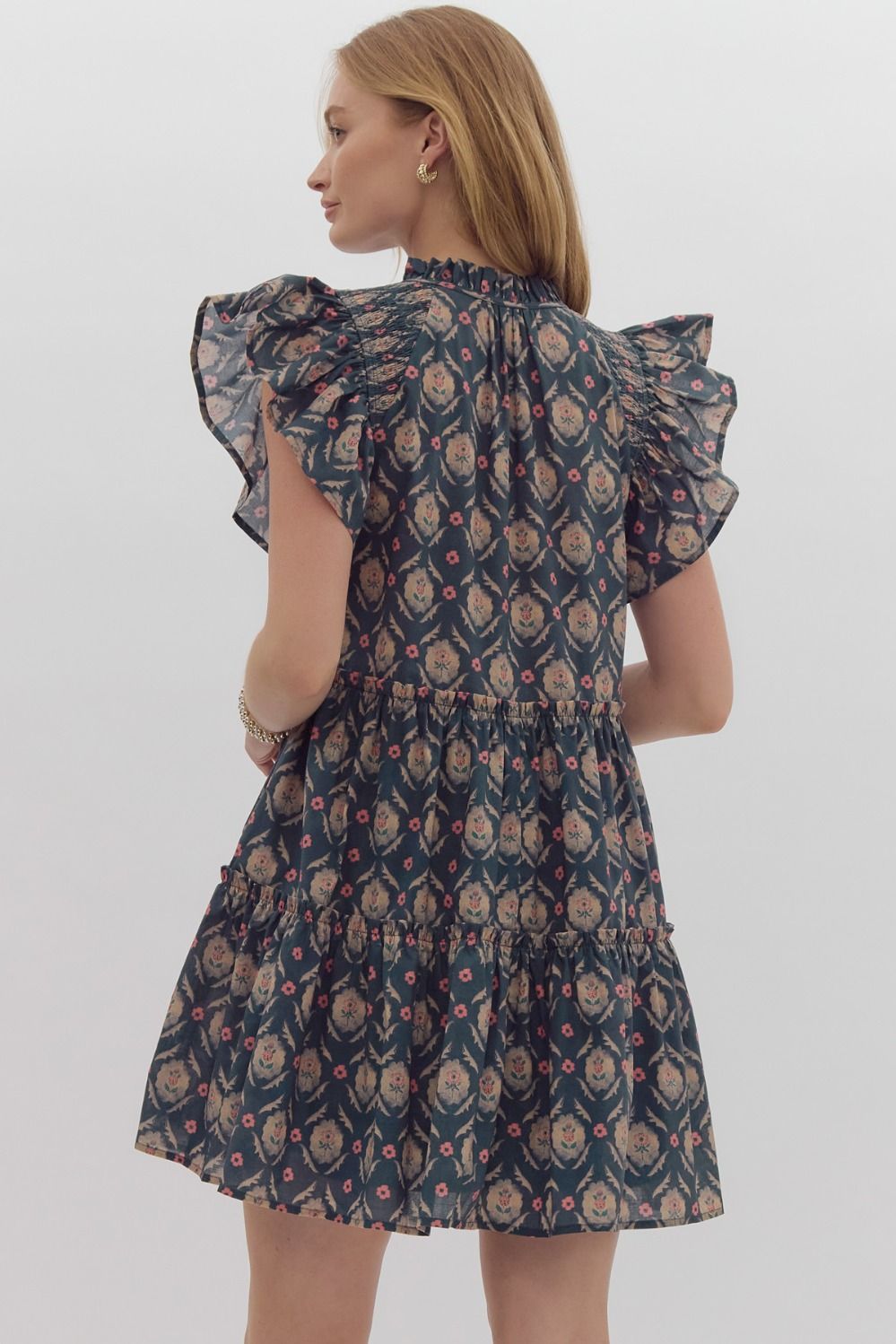 Entro Printed v-neck mini dress featuring pockets at side