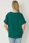 Solid v-neck top featuring asymmetric rounded hem detail. Unlined - 3 Colors