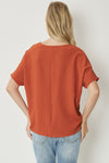 Solid v-neck top featuring asymmetric rounded hem detail. Unlined - 3 Colors