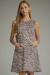 Animal print sleeveless mini dress with a round neckline