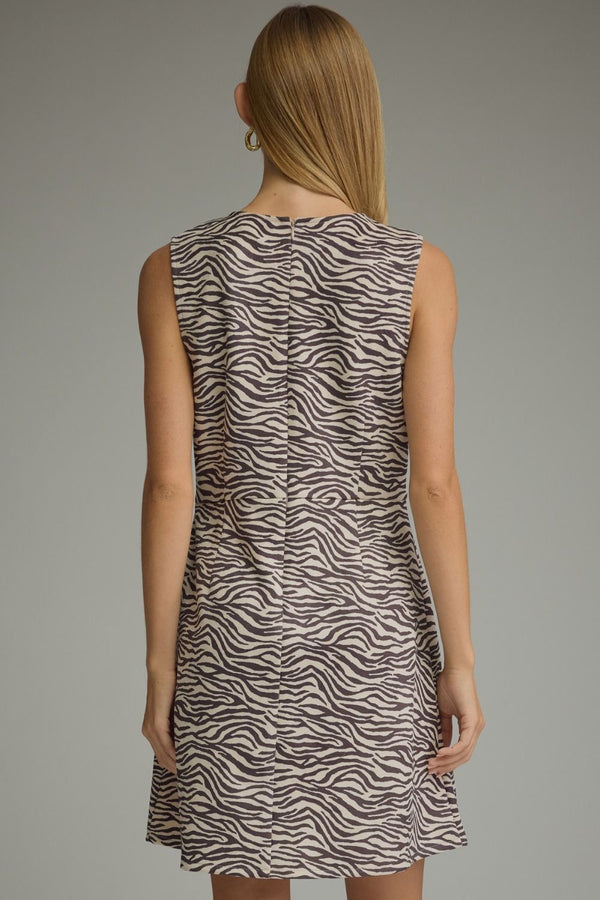 Animal print sleeveless mini dress with a round neckline