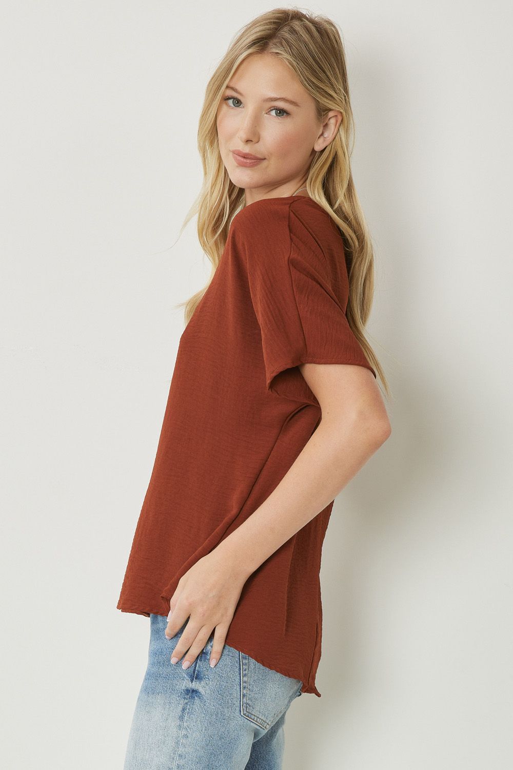 Solid v-neck top featuring asymmetric rounded hem detail -3 Colors Curvy Size