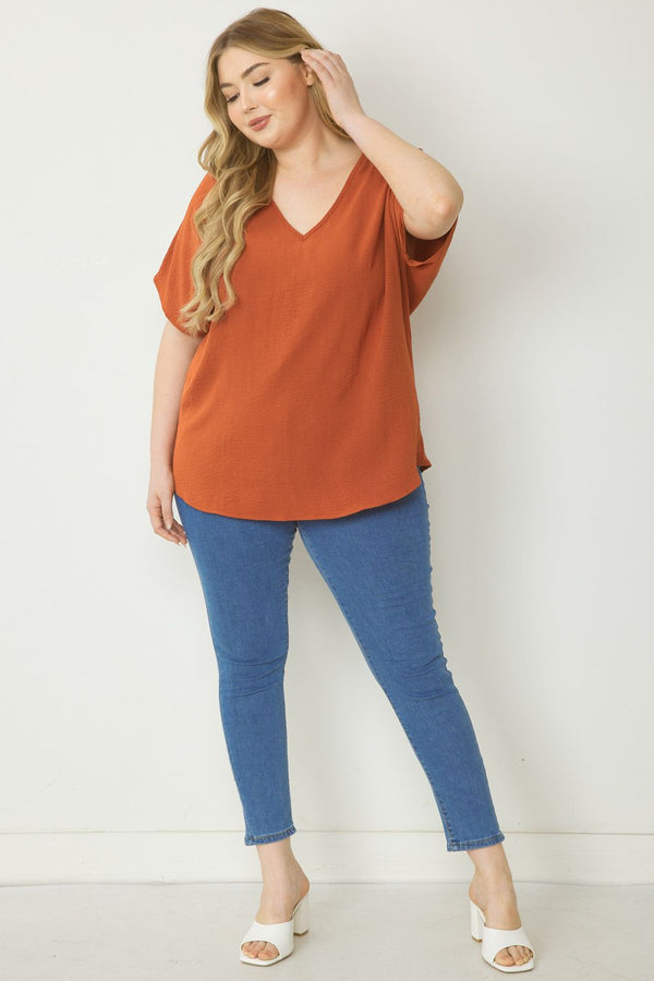 Solid v-neck top featuring asymmetric rounded hem detail -3 Colors Curvy Size