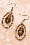 Fishhook oval hoop earrings with dangle bead charm