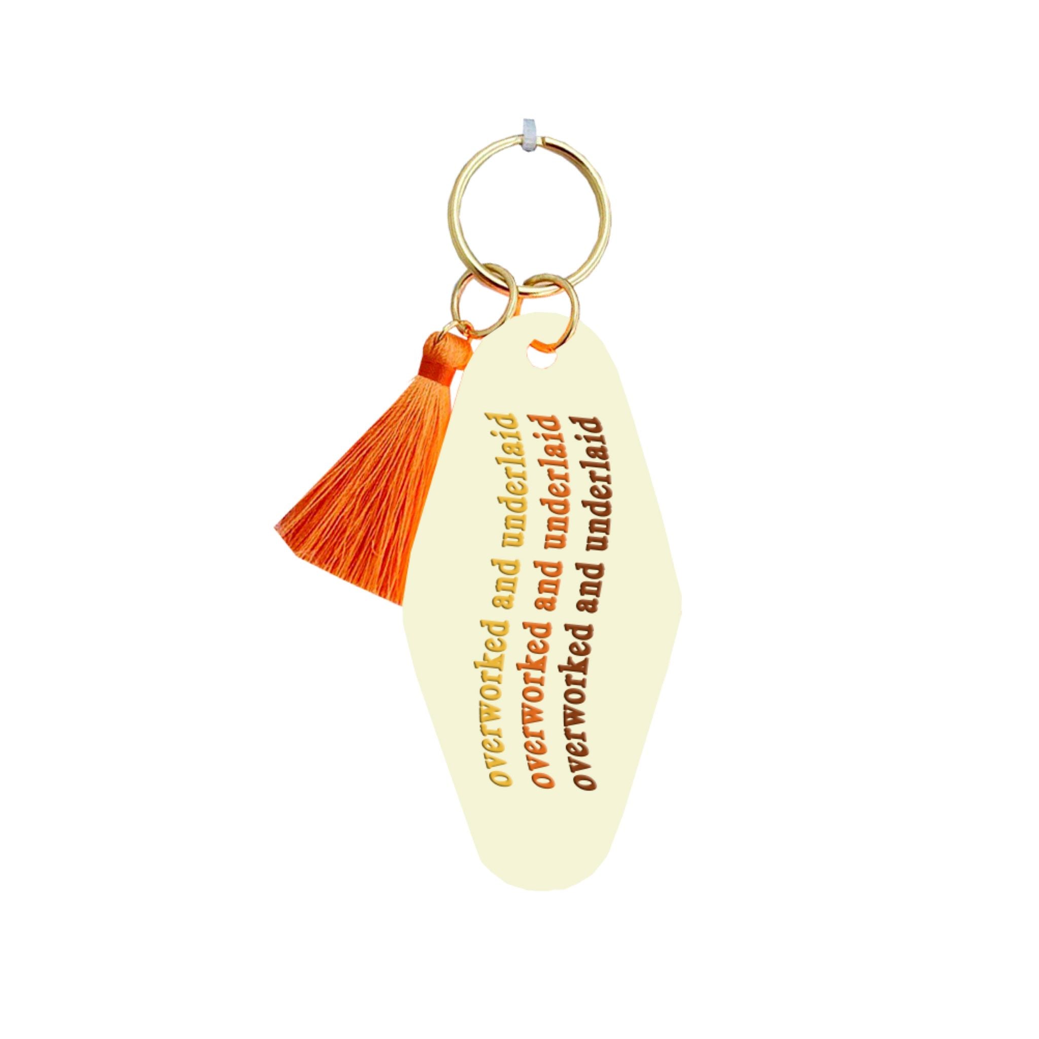 Overworked And Underlaid Keychain